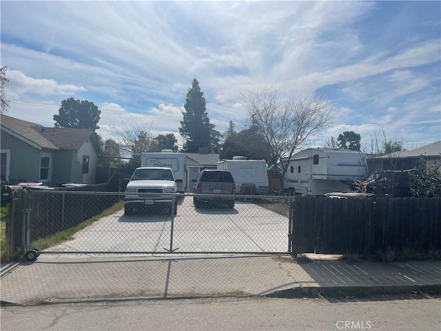 view of front of property featuring a residential view and a fenced front yard