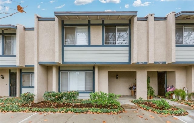 view of property featuring stucco siding