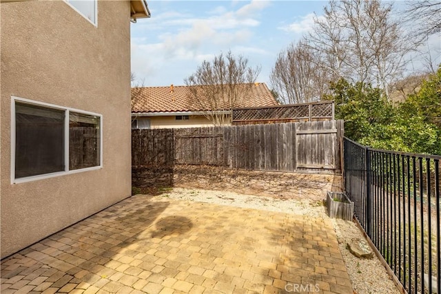 exterior space featuring a fenced backyard