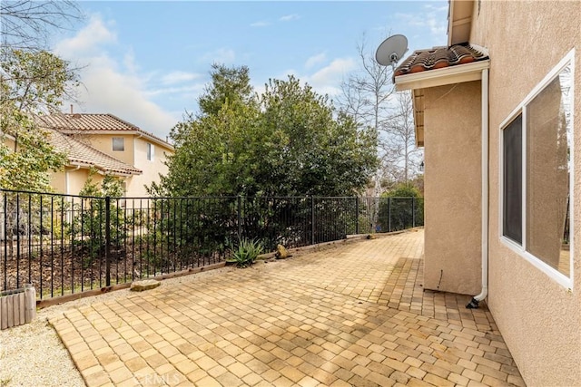 view of patio / terrace with fence