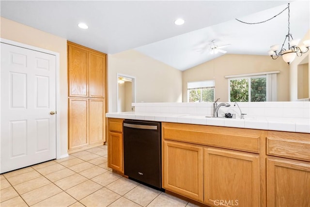 kitchen with light tile patterned floors, a sink, ceiling fan, vaulted ceiling, and dishwasher