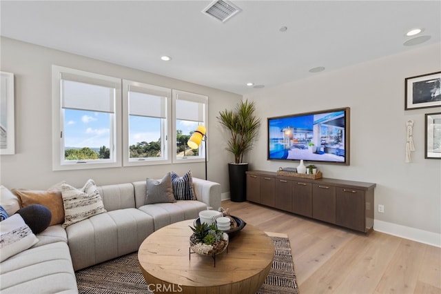 9522 N Andora Ave, Chatsworth, CA 91311 - living area with light wood-style floors, baseboards, visible vents, and recessed lighting