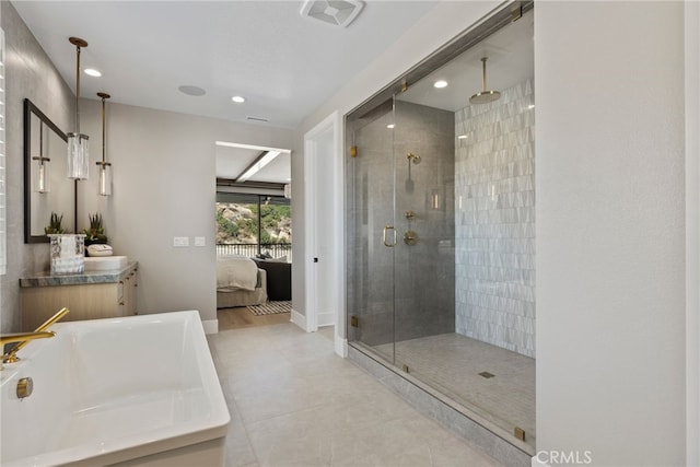 9522 N Andora Ave, Chatsworth, CA 91311 - bathroom with vanity, recessed lighting, tile patterned floors, ensuite bathroom, and a shower stall