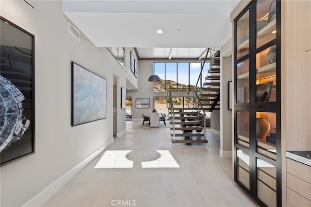 9522 N Andora Ave, Chatsworth, CA 91311 - hallway with recessed lighting, stairway, visible vents, and baseboards