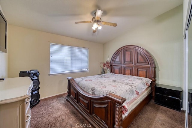 carpeted bedroom with baseboards and a ceiling fan