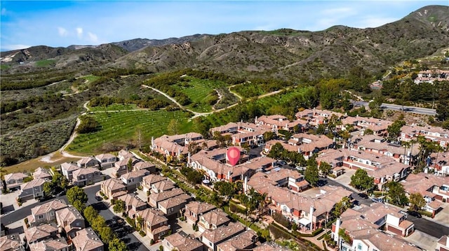 aerial view featuring a residential view and a mountain view