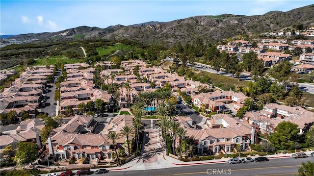 aerial view with a mountain view and a residential view