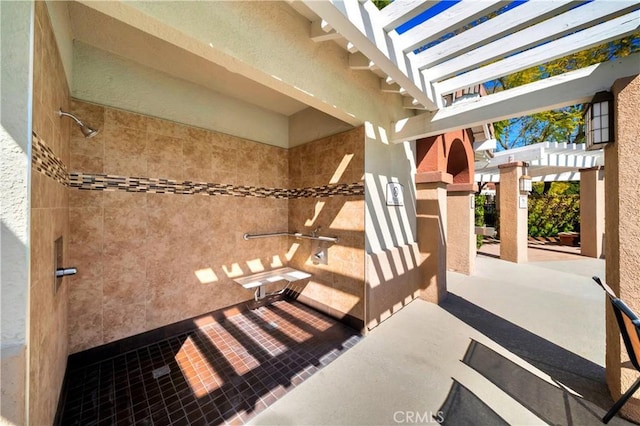 view of patio featuring a pergola