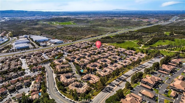 aerial view of property's location with nearby suburban area