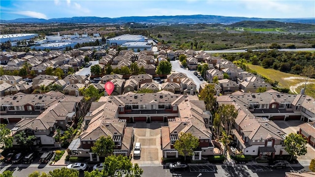 aerial perspective of suburban area with a mountain backdrop