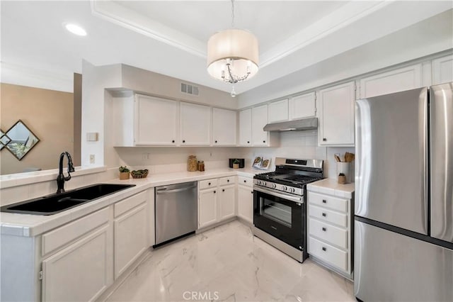 kitchen featuring visible vents, under cabinet range hood, marble finish floor, stainless steel appliances, and a sink