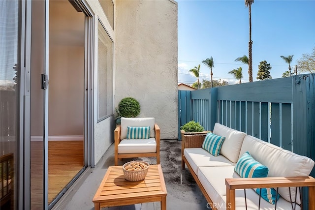 balcony featuring a patio and outdoor lounge area