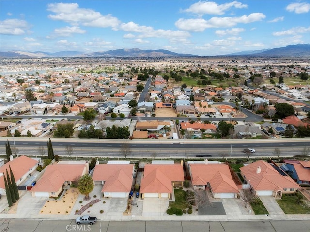 bird's eye view with a residential view and a mountain view