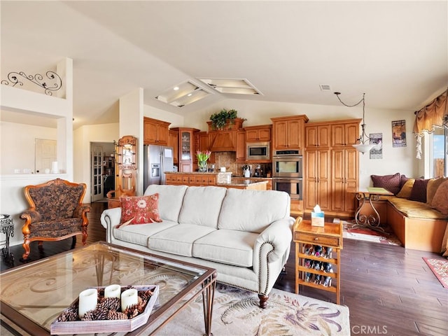 living room featuring visible vents, lofted ceiling, and dark wood-style floors