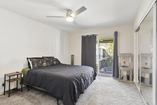 bedroom with access to outside, carpet, and ceiling fan