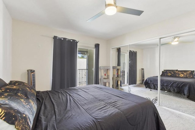 carpeted bedroom featuring a closet and a ceiling fan