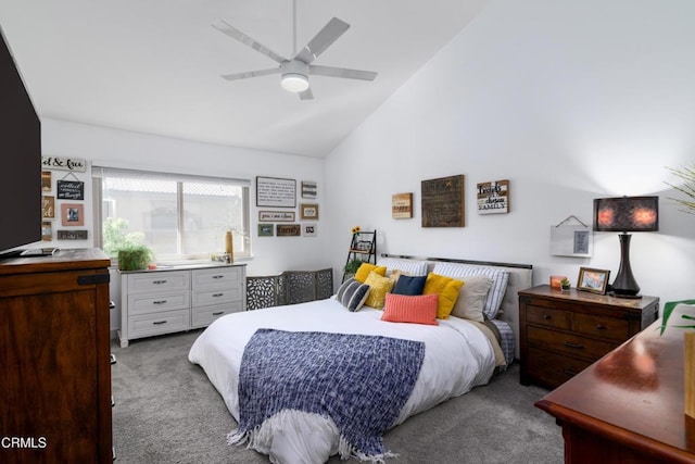 carpeted bedroom featuring high vaulted ceiling and ceiling fan