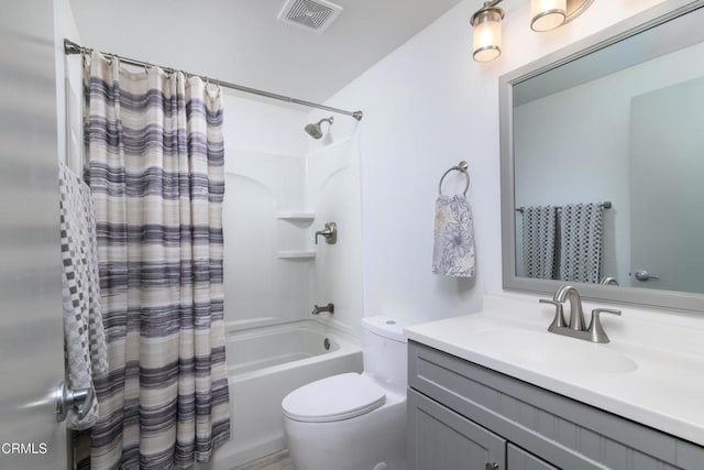 full bathroom featuring vanity, shower / tub combo, toilet, and visible vents