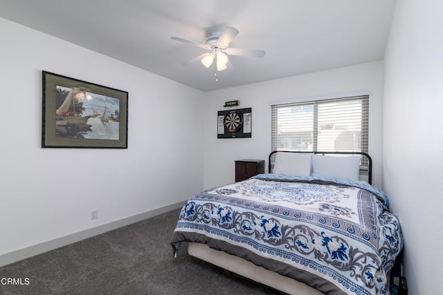 bedroom with carpet flooring, baseboards, and ceiling fan