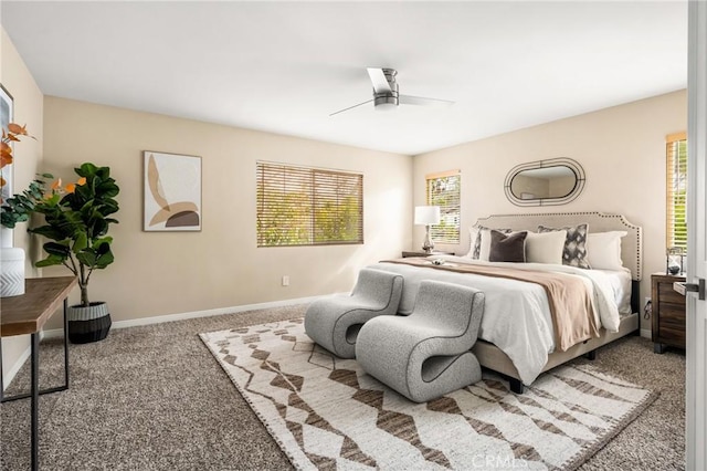 bedroom featuring baseboards, carpet, and a ceiling fan