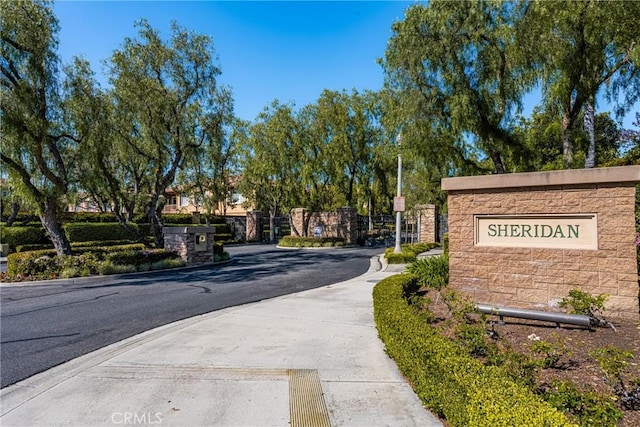 exterior space featuring a gate and a gated entry