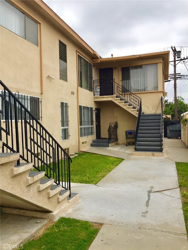 view of building exterior featuring stairs