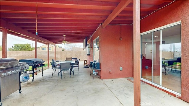 view of patio / terrace featuring outdoor dining space and fence