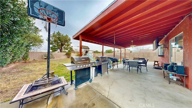 view of patio with outdoor dining area and a fenced backyard