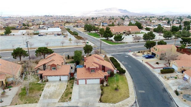 aerial view featuring a mountain view and a residential view