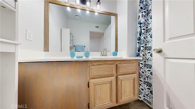 full bathroom featuring vanity