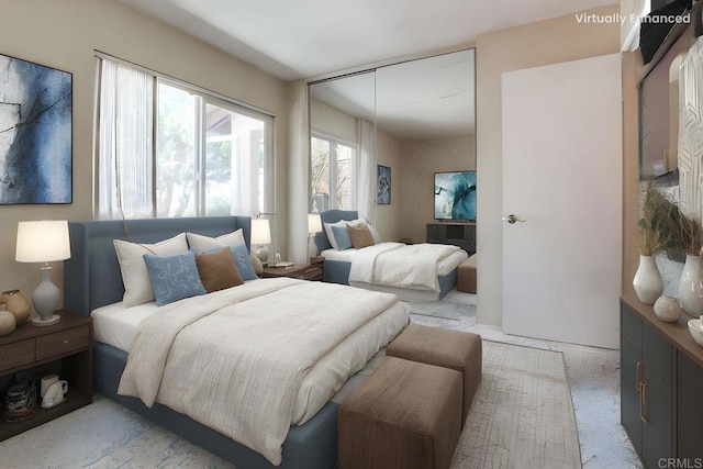 bedroom with a closet and carpet floors