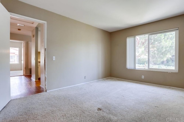 spare room featuring carpet flooring