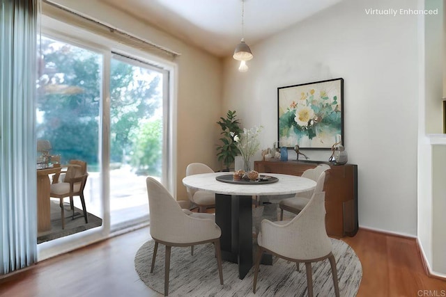 dining area featuring wood finished floors