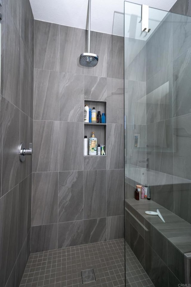 bathroom with a walk in shower