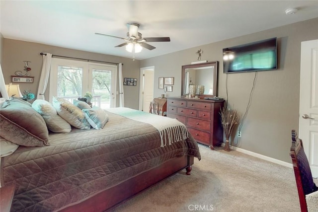 bedroom featuring baseboards, light carpet, ceiling fan, and access to outside