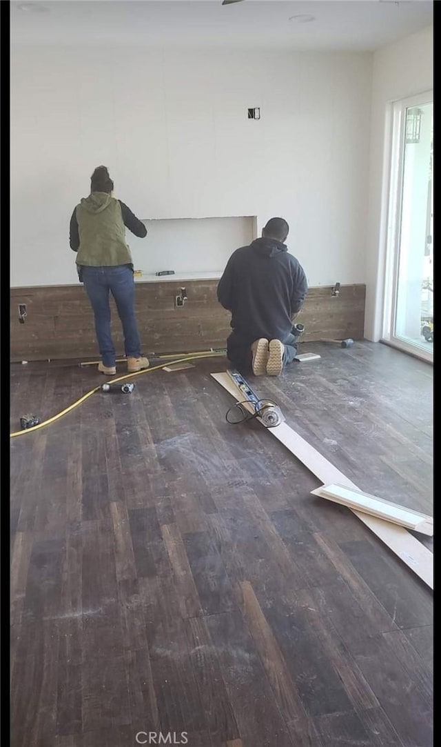 empty room featuring wood-type flooring