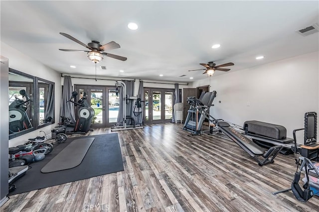 exercise room featuring visible vents, recessed lighting, french doors, wood finished floors, and a ceiling fan