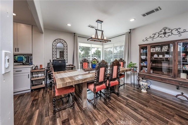 dining room with recessed lighting, visible vents, and dark wood finished floors