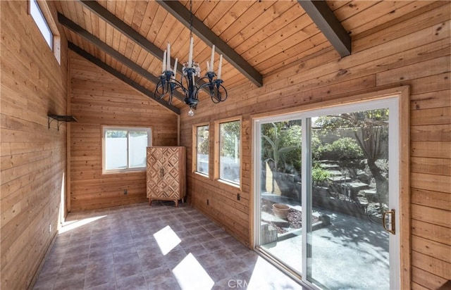 interior space featuring wooden walls, beamed ceiling, wooden ceiling, an inviting chandelier, and high vaulted ceiling