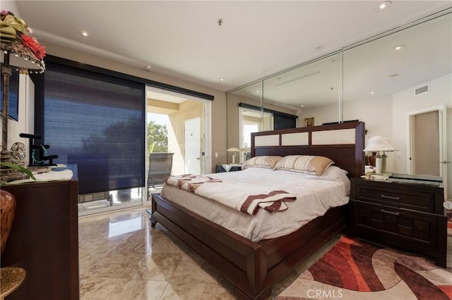 bedroom with access to outside, recessed lighting, visible vents, and marble finish floor