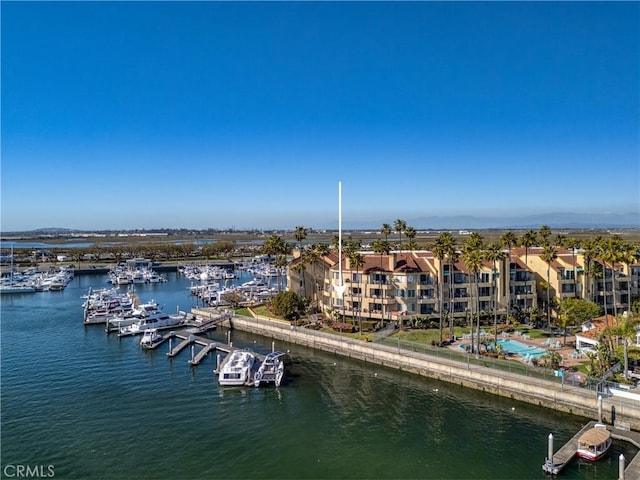 birds eye view of property featuring a water view