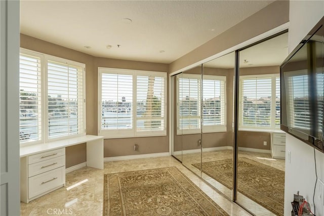 bathroom featuring baseboards