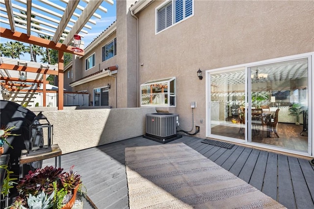 deck with central air condition unit and a pergola