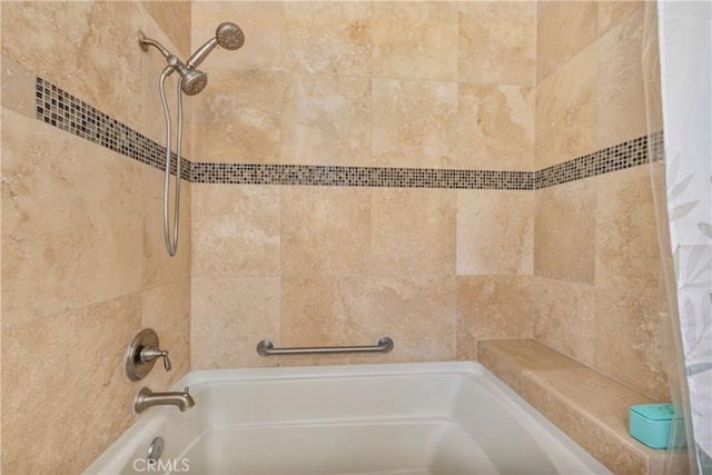 bathroom with shower / bath combination with curtain