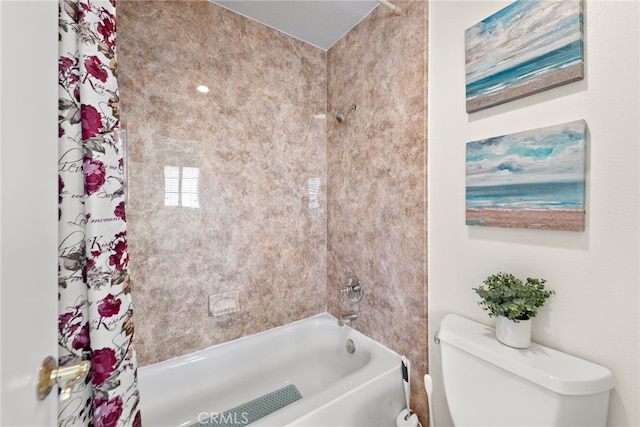 full bath with toilet and shower / bath combo with shower curtain