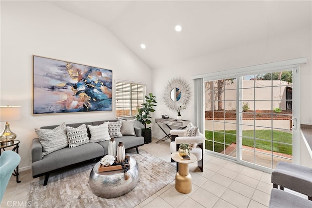 living area featuring tile patterned flooring, recessed lighting, high vaulted ceiling, and baseboards