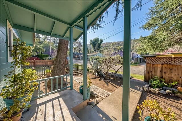 view of patio / terrace featuring fence