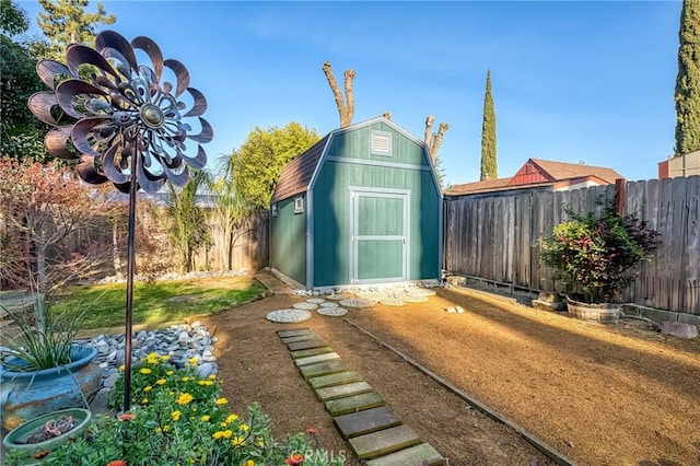 view of shed featuring a fenced backyard