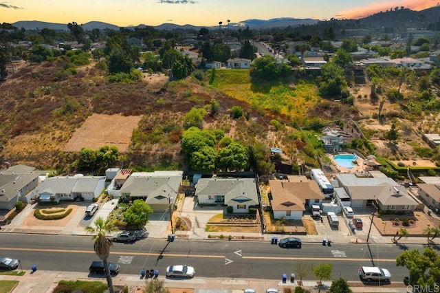 aerial view featuring a mountain view and a residential view