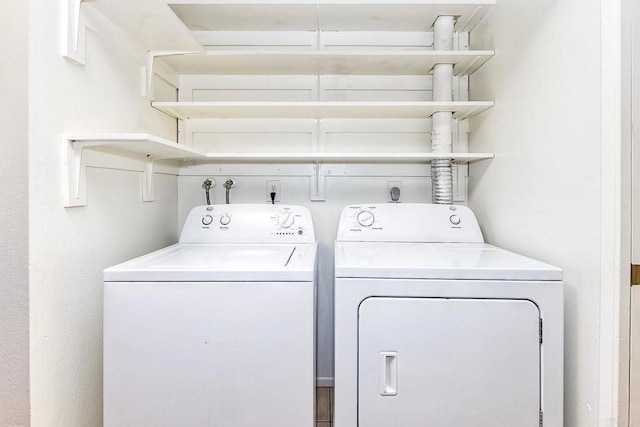 laundry area featuring laundry area and separate washer and dryer